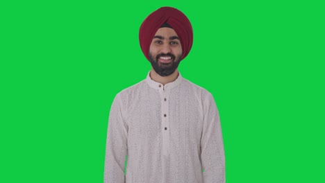 Happy-Sikh-Indian-man-smiling-to-the-camera-Green-screen
