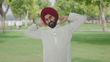 Sleepy-and-tired-Sikh-Indian-man-in-park