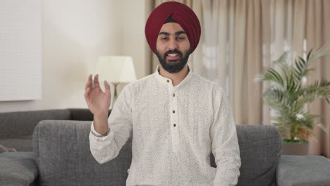 Feliz-Hombre-Indio-Sikh-Saludando
