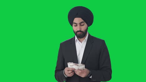 Trauriger-Sikh-indischer-Geschäftsmann,-Der-Geld-Zählt,-Grüner-Bildschirm
