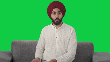 Hombre-Indio-Sikh-Enojado-Gritándole-A-Alguien-Pantalla-Verde
