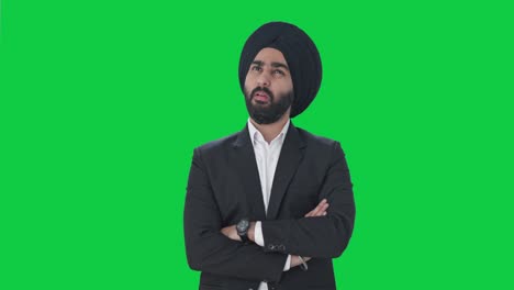 Confused-Sikh-Indian-businessman-thinking-Green-screen