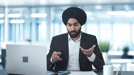 Angry-Sikh-Indian-businessman-shouting-on-employees