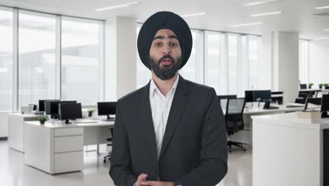 Happy-Sikh-Indian-businessman-talking