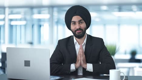 Happy-Sikh-Indian-businessman-doing-Namaste