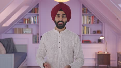 Serious-Sikh-Indian-man-talking-to-the-camera