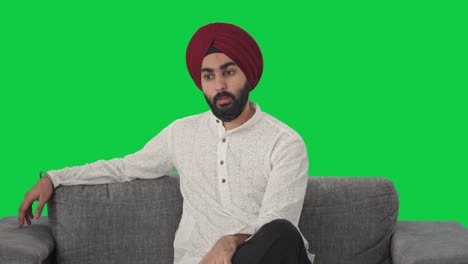 Verärgerter-Sikh-Indianer-Schlägt-Sich-Auf-Den-Kopf,-Grüner-Bildschirm