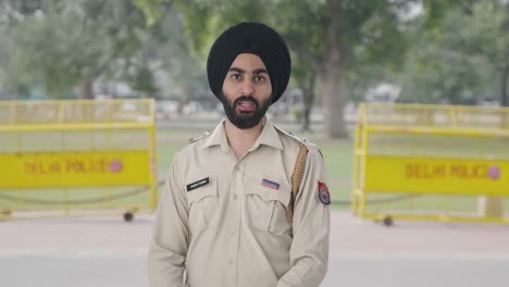 Angry-Sikh-Indian-police-man-talking