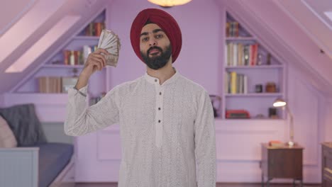 Egoistischer-Sikh-Indianer,-Der-Geld-Als-Fächer-Benutzt