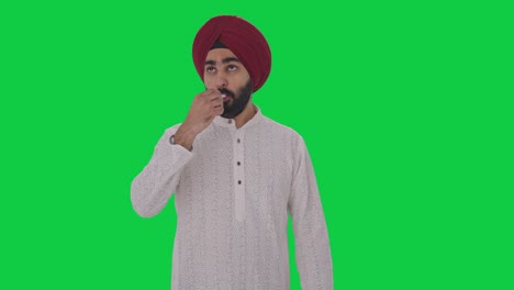 Kranker-Sikh-Indianer-Misst-Fieber-Mit-Grünem-Thermometer-Bildschirm