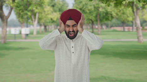 Frustrated-Sikh-Indian-man-shouting-in-park