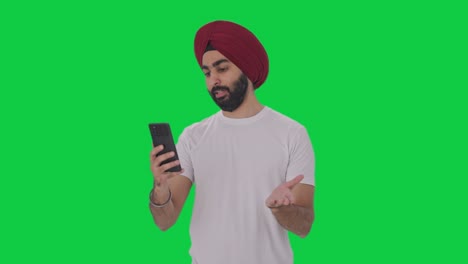 Sikh-Indianer-Spricht-über-Videoanruf-Auf-Grünem-Bildschirm