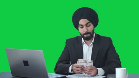 Egoistischer-Indischer-Sikh-Geschäftsmann,-Der-Geld-Zählt,-Grüner-Bildschirm