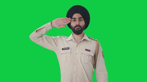 Proud-Sikh-Indian-police-man-saluting-Green-screen