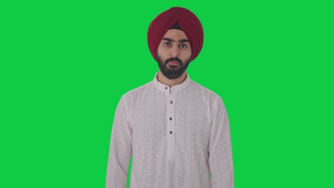 Sikh-Indian-man-looking-to-the-camera-Green-screen
