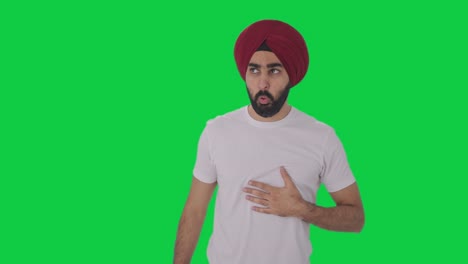 Sick-Sikh-Indian-man-having-an-Asthma-attack-Green-screen