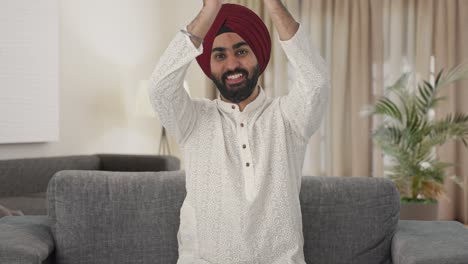 Happy-Sikh-Indian-man-clapping-and-appreciating