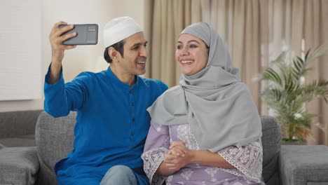 Happy-Muslim-couple-making-a-vlog-for-social-media