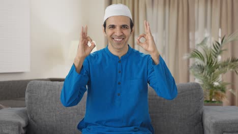 Happy-Muslim-man-showing-okay-sign