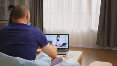 Man-during-coronavirus-quarantine-on-a-video-call-with-doctor