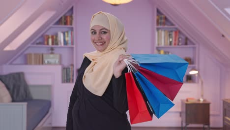 Happy-Muslim-woman-doing-Shopping