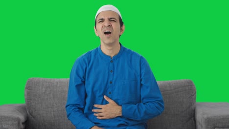 Sick-Muslim-man-having-heart-attack-Green-screen