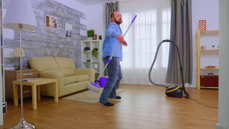 Funny-man-dancing-with-the-mop