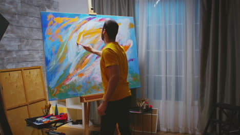 Inspired-man-while-painting