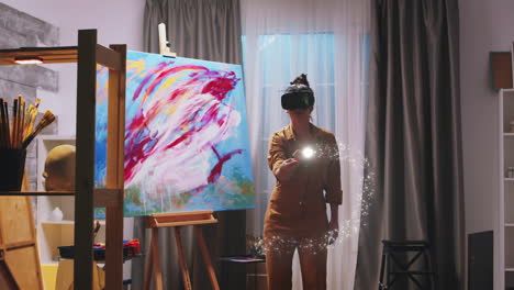 Female-painter-using-virtual-reality-headset
