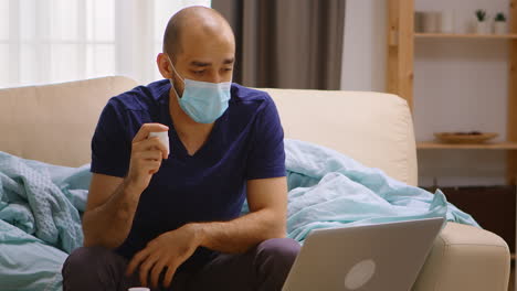 Ill-man-at-home-talking-online-with-his-doctor