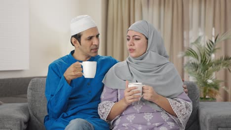 Muslim-couple-drinking-tea-at-home