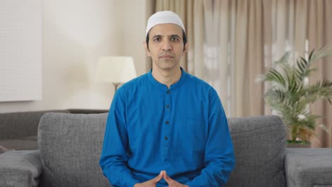 Muslim-man-looking-to-the-camera
