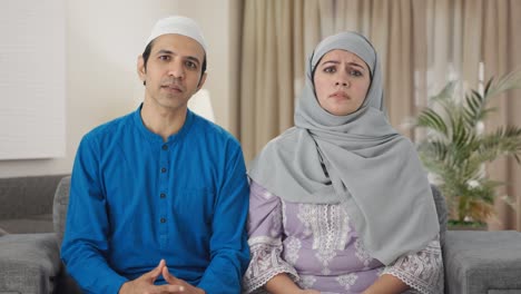 Angry-Muslim-couple-shouting-on-someone