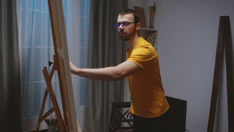 Guy-working-on-painting