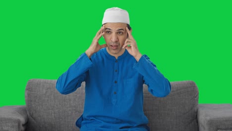 Kranker-Muslimischer-Mann-Leidet-Unter-Kopfschmerzen,-Grüner-Bildschirm