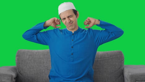 Sleepy-and-tired-Muslim-man-Green-screen