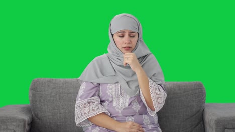 Kranke-Muslimische-Frau,-Die-Unter-Fieber-Leidet,-Grüner-Bildschirm