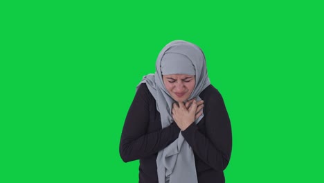 Sick-Muslim-woman-having-a-Heart-attack-Green-screen