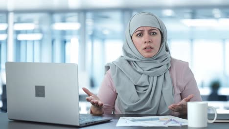 Angry-Muslim-businesswoman-talking-to-camera