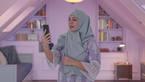 Muslim-woman-talking-on-video-call