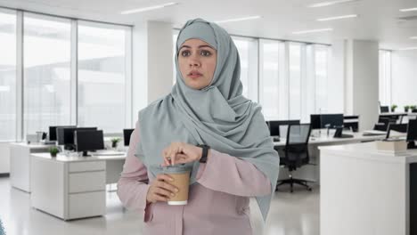 Tensed-Muslim-businesswoman-waiting-for-someone