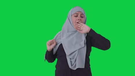 Sleepy-and-tired-Muslim-woman-Green-screen