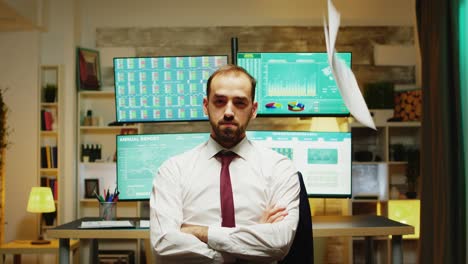 Portrait-of-stock-market-broker-looking-serious-at-the-camera