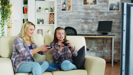 Mother-and-daughter-playing-video-games