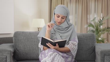 Muslim-woman-writing-a-diary