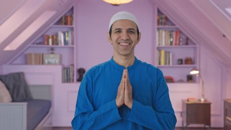 Happy-Muslim-man-doing-Namaste