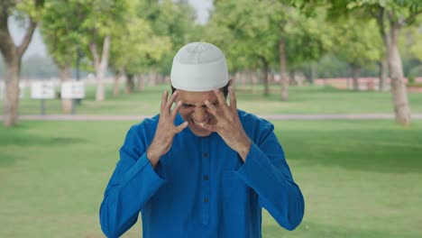 Frustrated-Muslim-man-shouting-on-someone-in-park