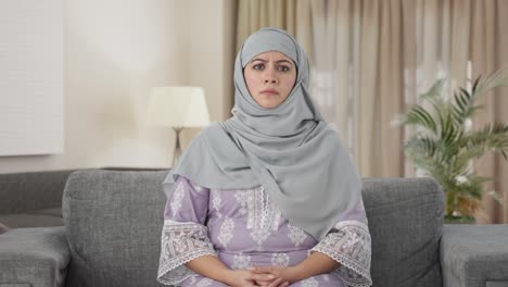 Angry-Muslim-woman-looking-to-the-camera