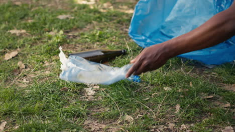 People-supporting-cleanup-of-the-natural-environment-by-grabbing-recyclables