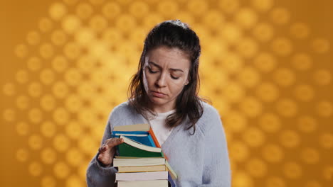 Portrait-of-woman-browsing-through-stack-of-textbooks,-gathering-information